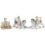 Novelty Victorian bisque dog porcelain including a group of teacher and two pupils, the largest each
