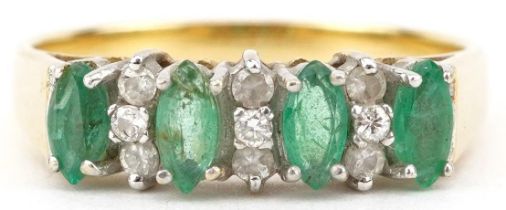 18ct gold emerald and diamond ring set with nine diamonds, size O, 3.8g : For further information on