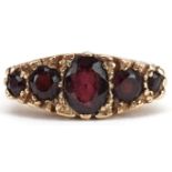 Victorian style 9ct gold graduated garnet five stone ring, the largest garnet approximately 6.6mm