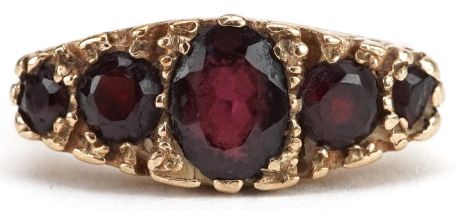 Victorian style 9ct gold graduated garnet five stone ring, the largest garnet approximately 6.6mm