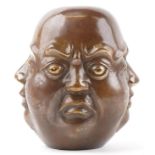 Large Chinese patinated bronze Buddha head, character marks to the base, 19cm high : For further