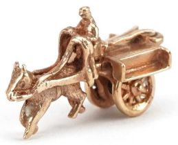 9ct gold horse-drawn cart charm with rotating wheels, 2.4cm wide, 3.2g : For further information