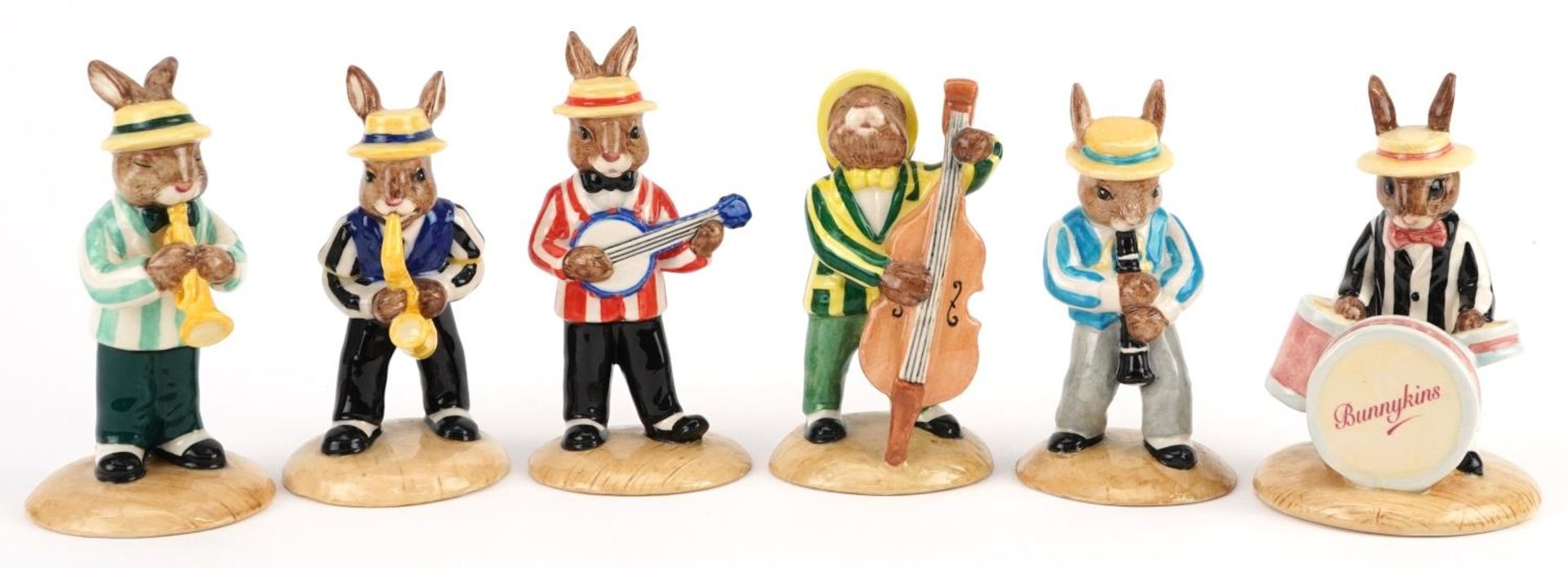 Six Royal Doulton Bunnykins jazz band figures with certificates comprising Saxophone Player