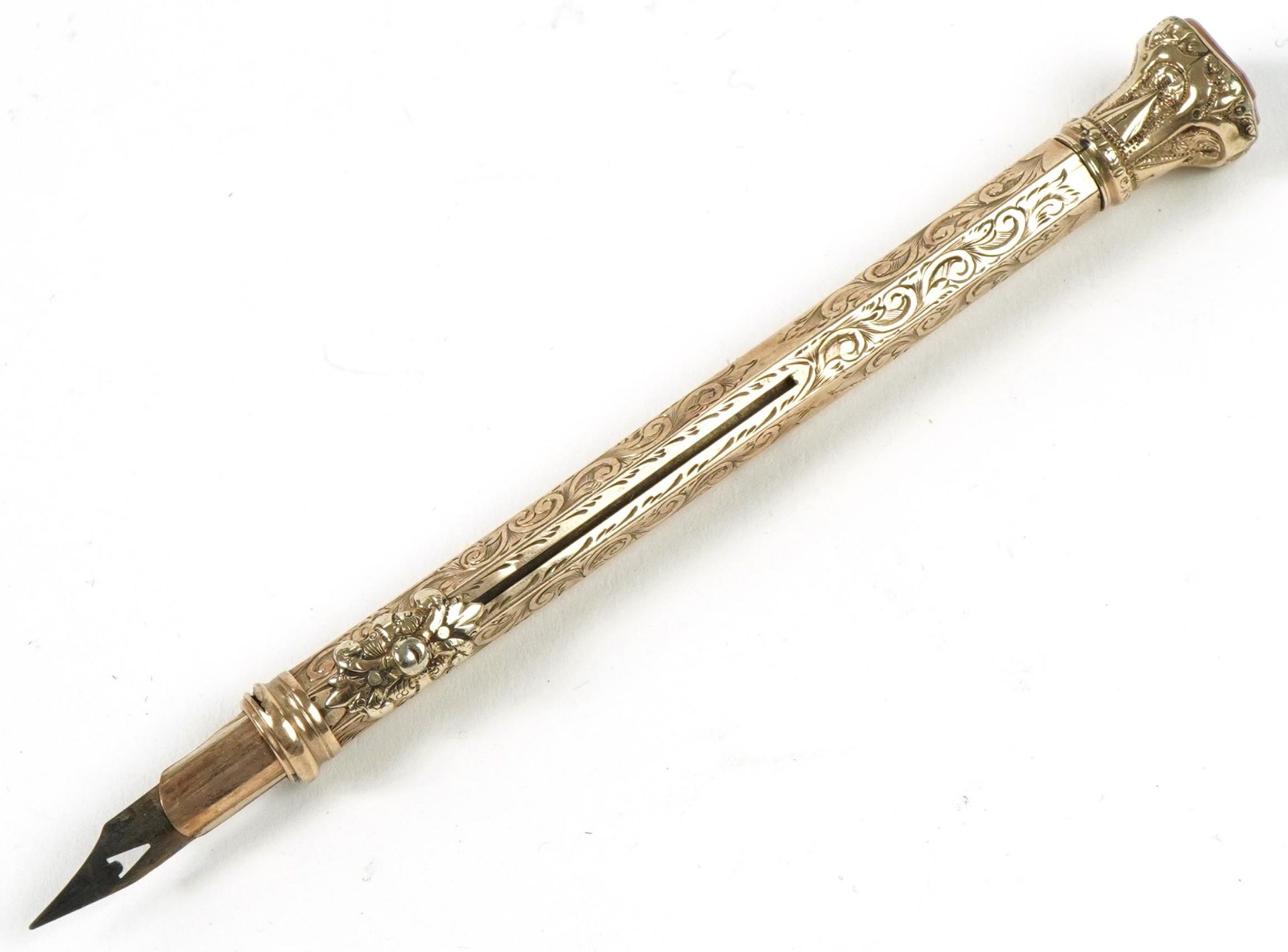 Victorian unmarked gold combination propelling pencil and dip pen with hardstone seal top end, 21.8g