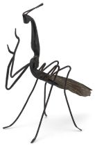 Modernist metal sculpture of a preying mantis, 14cm in length