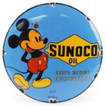 Automobilia interest Sunoco Oil convex enamel advertising sign with Mickey Mouse, 30cm in diameter