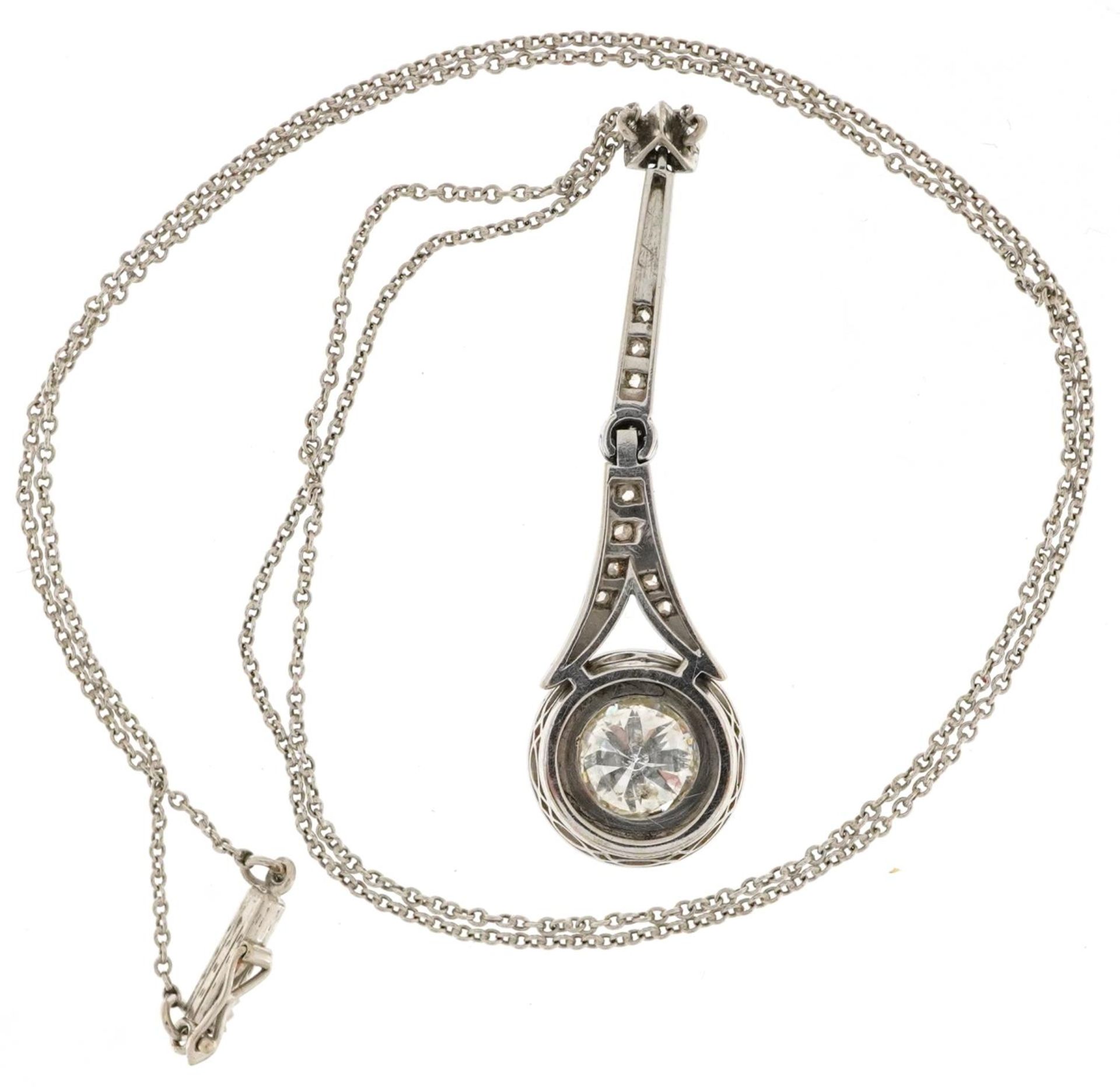 Unmarked white gold diamond pendant on an unmarked white gold necklace, the largest diamond - Image 3 of 4