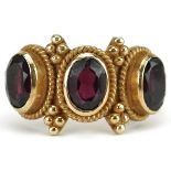 Victorian style garnet three stone ring with cast setting, size M, 3.9g