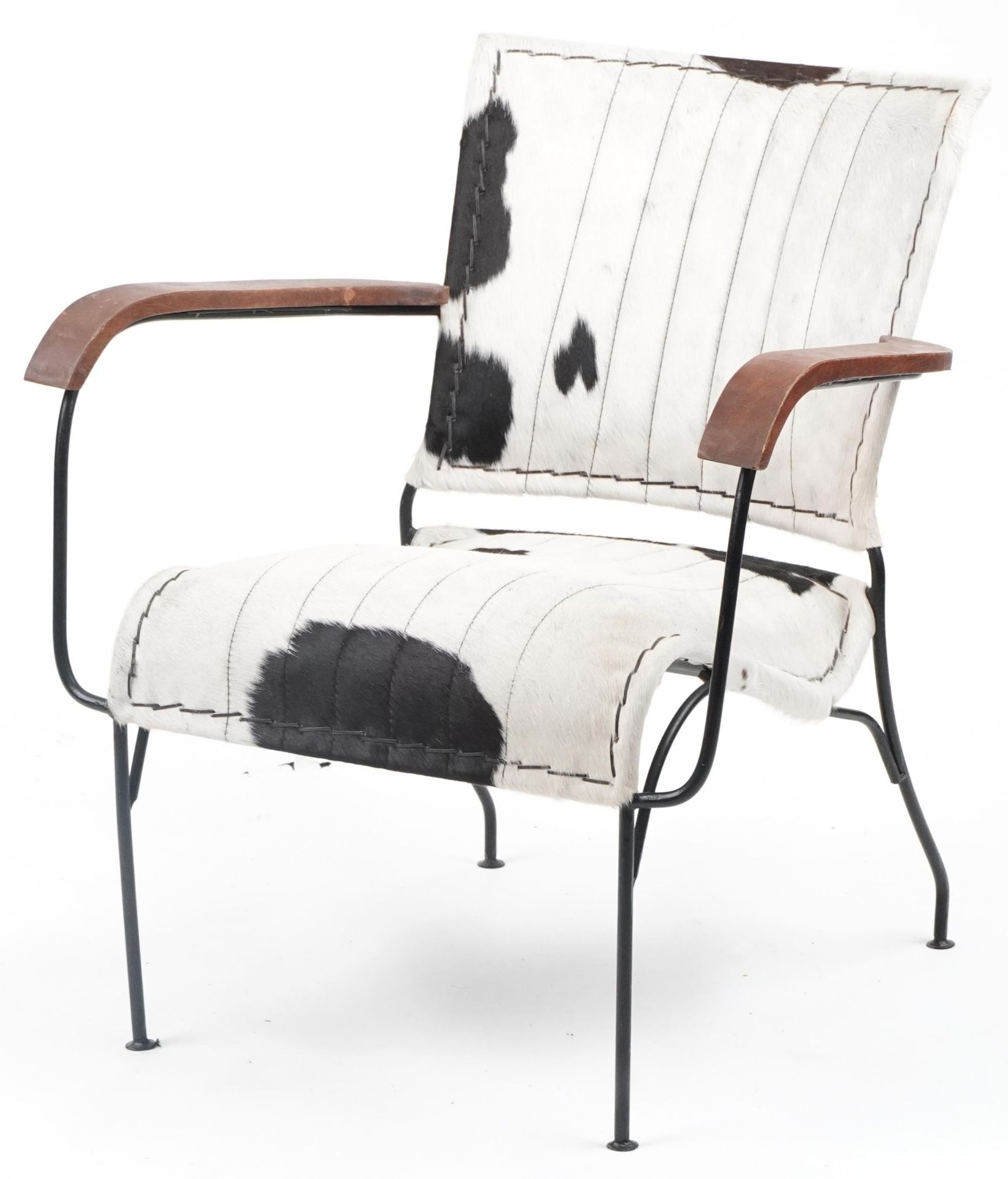 Brutalist style wrought iron and cow hide armchair, 75cm high