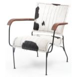 Brutalist style wrought iron and cow hide armchair, 75cm high