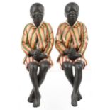 Pair of hand painted plaster bookends in the form of Blackamoors, each 46cm high