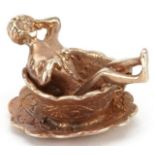9ct gold charm in the form of a nude figure in a cup, engraved You're My Cup of Tea, 2.1cm wide, 6.