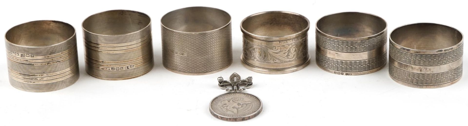 Six George V and later silver napkin rings including two pairs and a 1967 United States of America - Image 4 of 9