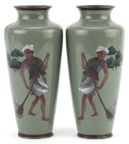 Pair of Japanese cloisonne vases, each enamelled with a man sweeping, each 19cm high