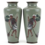 Pair of Japanese cloisonne vases, each enamelled with a man sweeping, each 19cm high