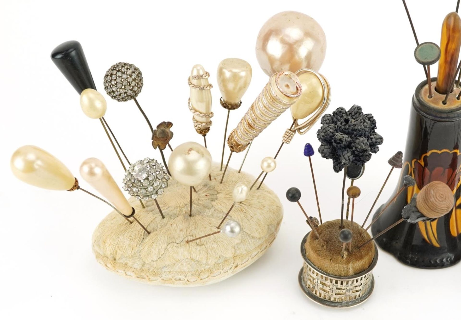 Collection of early 20th century and later hatpins arranged in four hatpin stands including two - Image 2 of 4