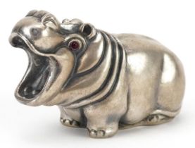 Silver hippopotamus with cabochon ruby eyes, impressed Russian marks to the base, 7.5cm in length,
