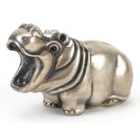 Silver hippopotamus with cabochon ruby eyes, impressed Russian marks to the base, 7.5cm in length,