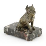 Silver plated model of a seated Pitbull raised on a rectangular marble base, 11cm in length
