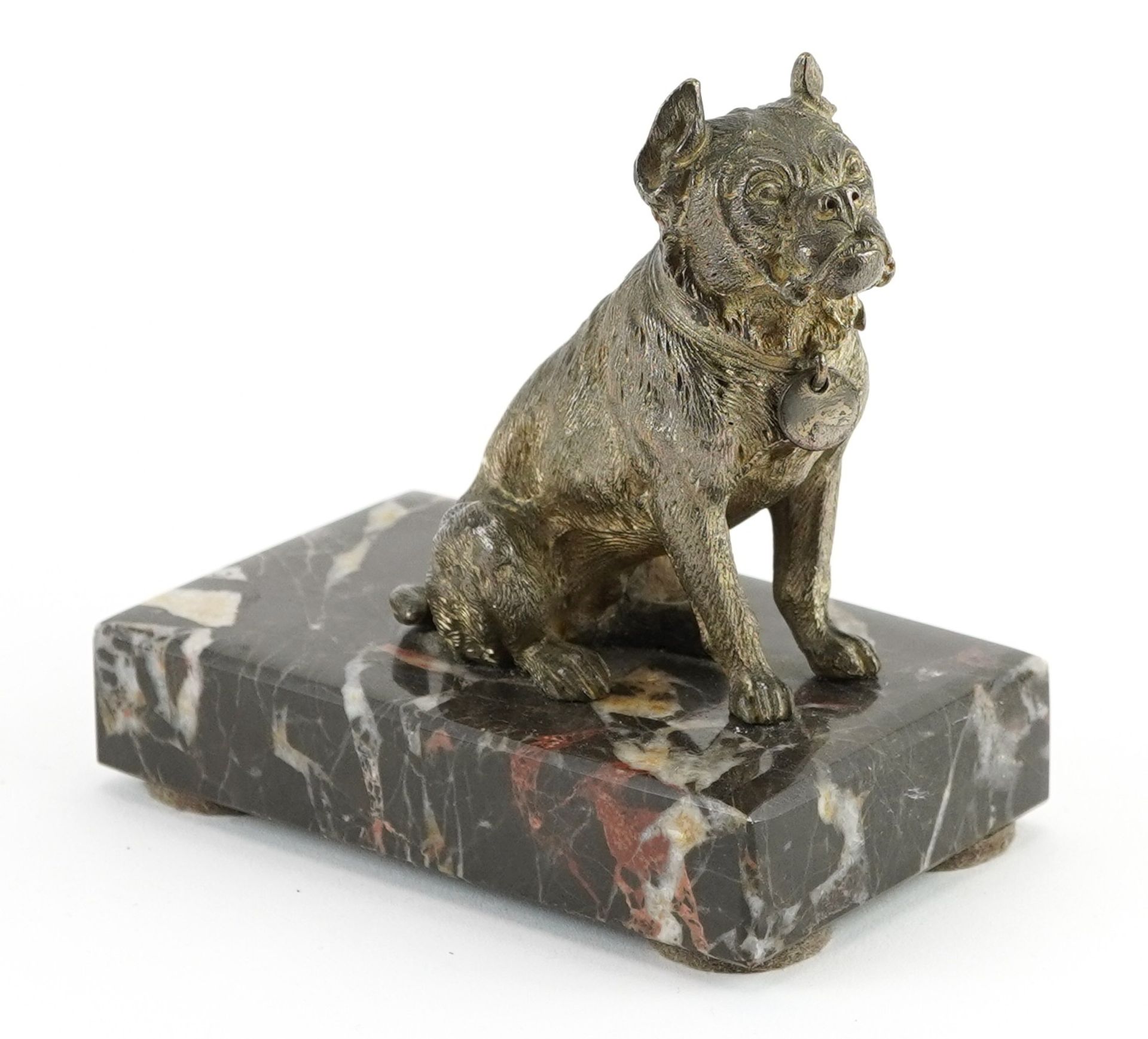 Silver plated model of a seated Pitbull raised on a rectangular marble base, 11cm in length