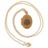 9ct gold oval locket with engine turned decoration on 9ct gold Belcher link necklace, 3.1cm high and