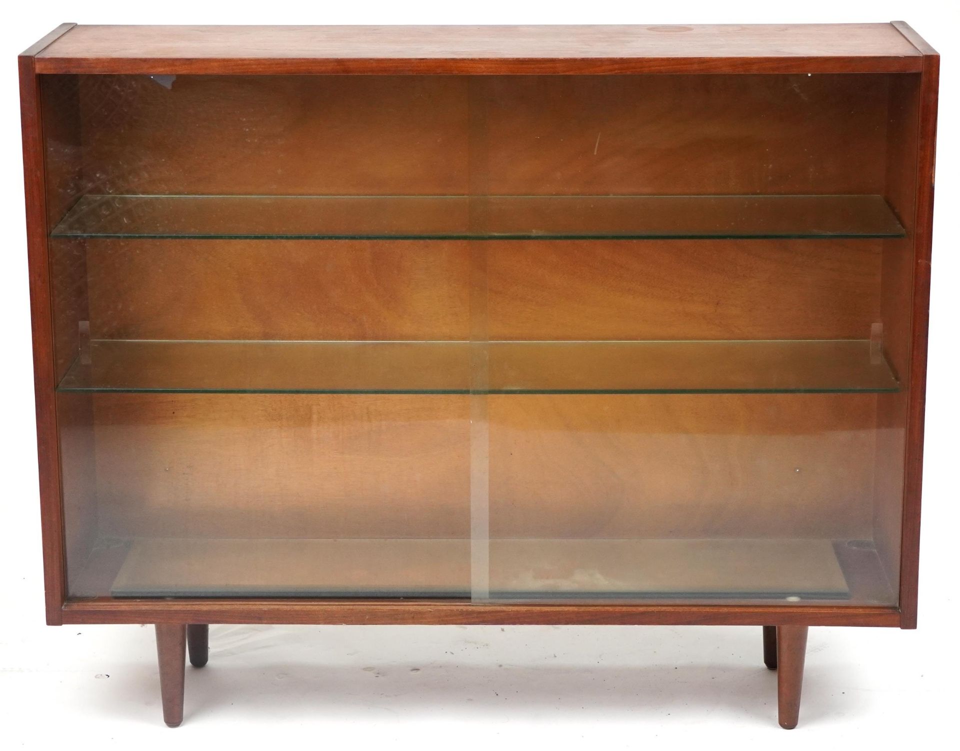 Mid century teak bookcase fitted with two sliding glass doors enclosing two adjustable glass - Image 2 of 4