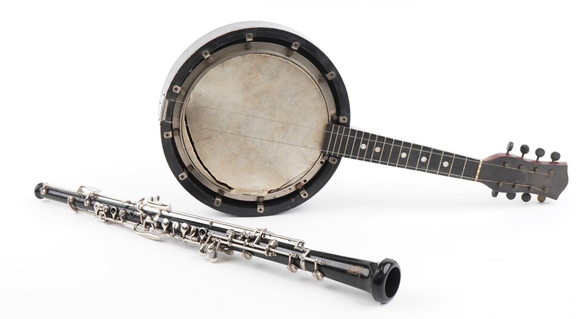 Reliance eight string banjolele and a Boosey & Hawkes three piece clarinet, both with cases, the