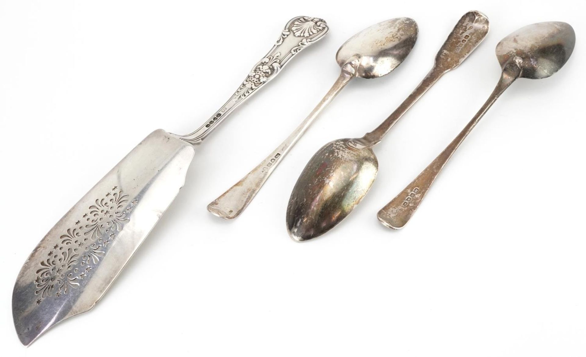 George IV and later silver comprising three Georgian tablespoons and a Victorian fish slice by - Image 2 of 5