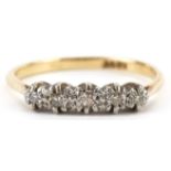 18ct gold graduated diamond five stone ring, size O, 2.5g