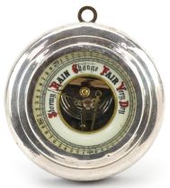 George V circular silver mounted mahogany wall barometer having enamelled dial with Arabic numerals,