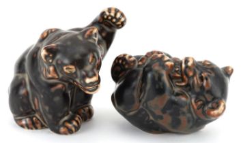 Knud Kyhn for Royal Copenhagen, two mid century Danish bear cubs having mottled brown glazes,