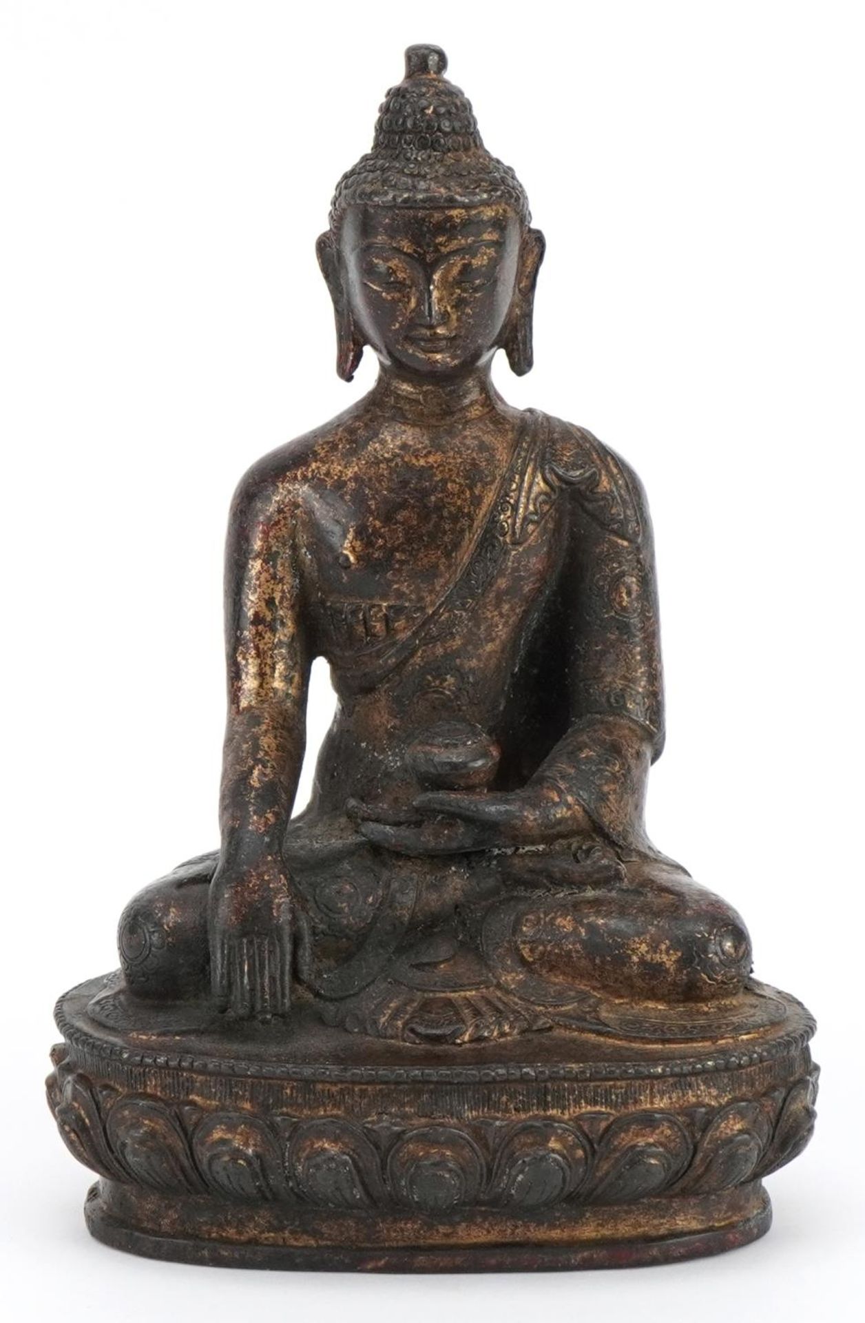 Chino Tibetan partially gilt bronze figure of seated Buddha, 20.5cm high