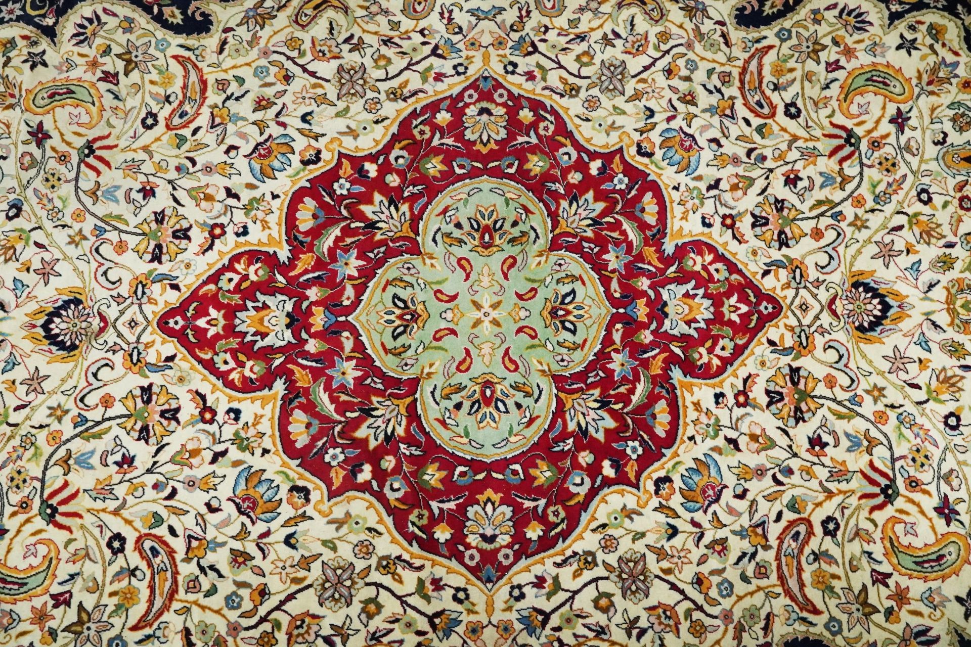 Rectangular Persian cream and red ground rug having an all over repeat floral design, 370cm x 270cm - Image 6 of 12