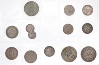 19th century and later British and world coinage arranged in an album, some Maundy examples,