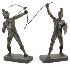 Pair of patinated spelter figures of a Greek archer and warrior, the largest 30cm high