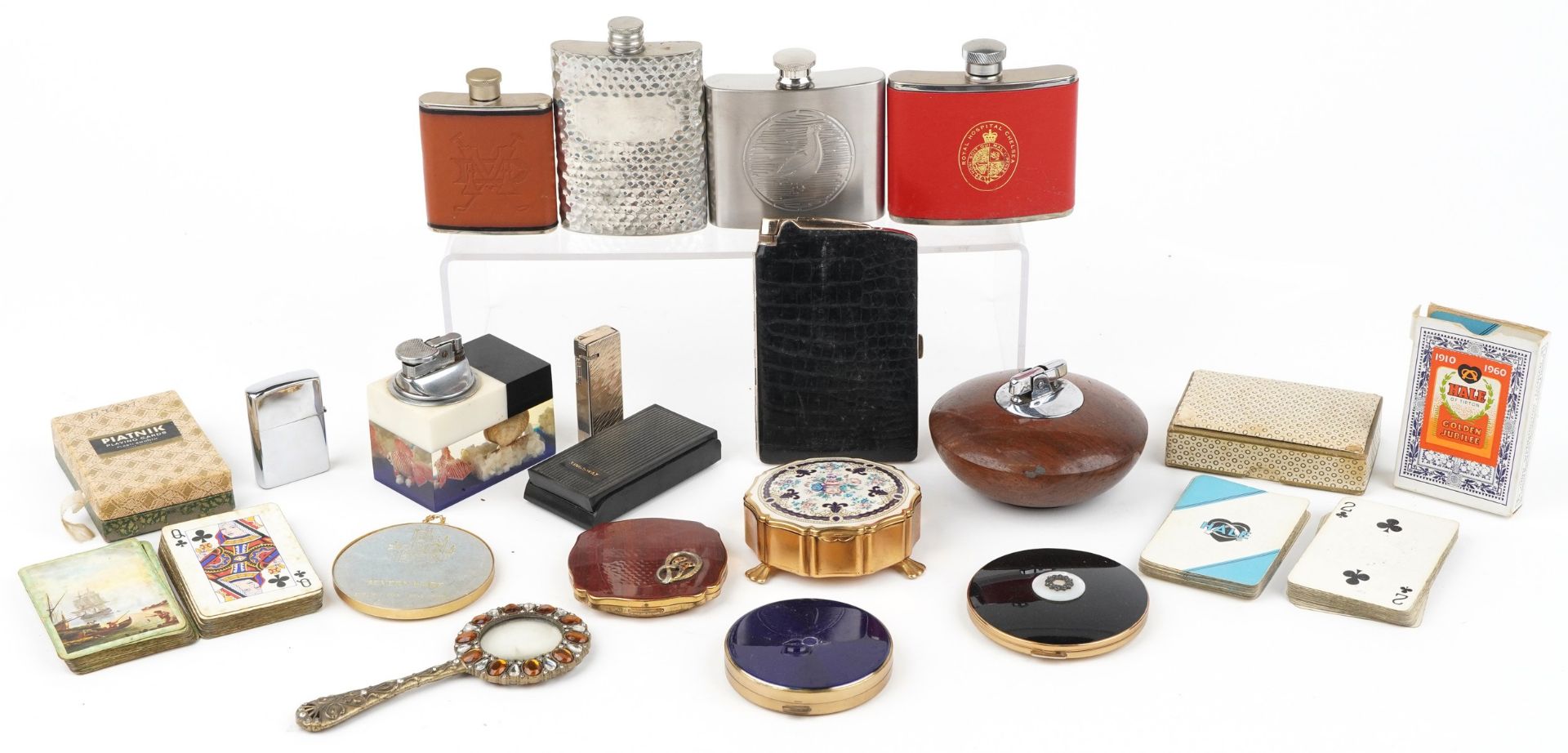 Sundry items including a marine table lighter, hip flasks, compact and vintage playing cards, the