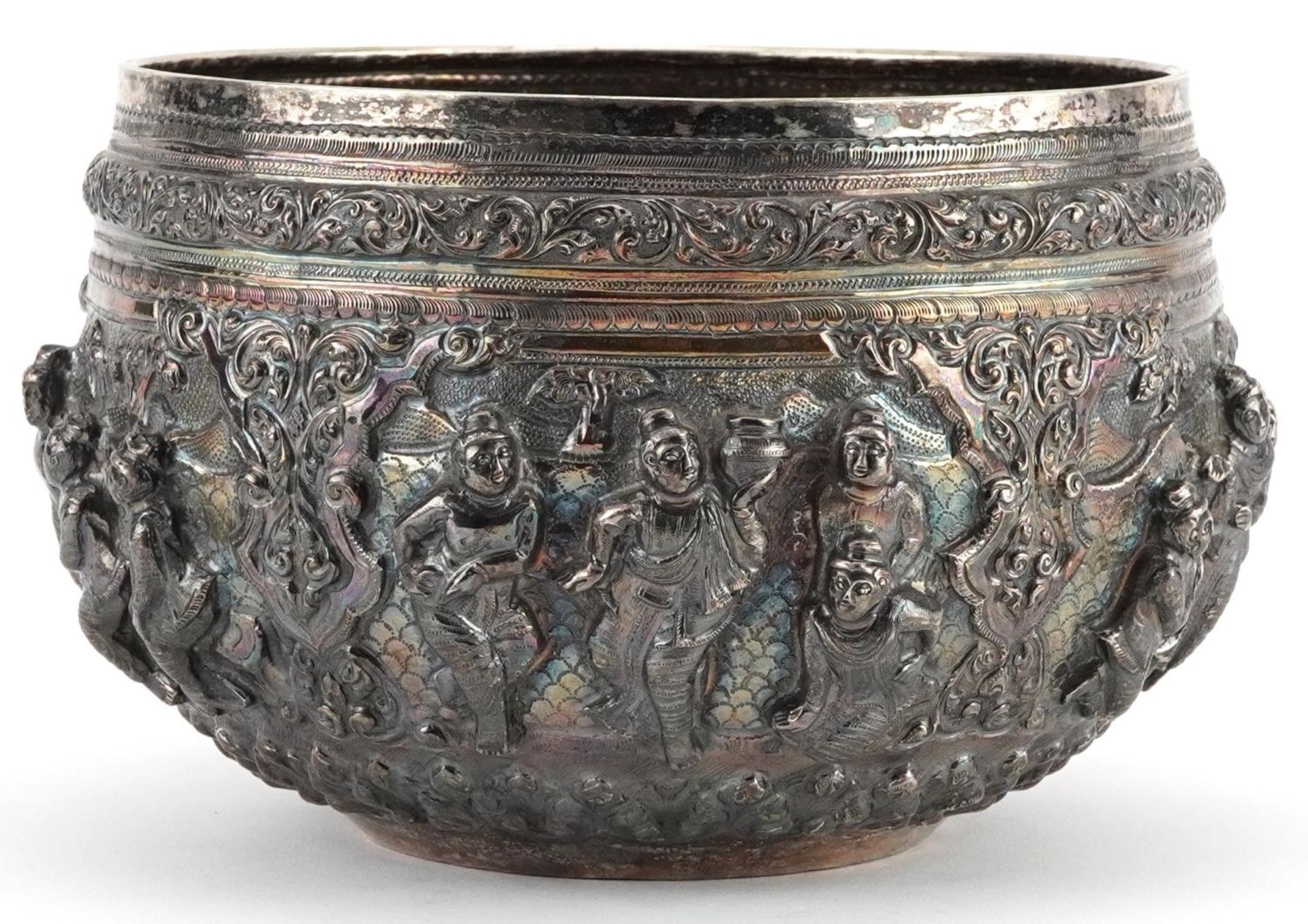 Burmese unmarked silver bowl profusely embossed with deities and animals within landscapes, 12cm - Image 2 of 10