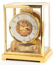 Jaeger LeCoultre brass cased Atmos clock having circular dial with Arabic numerals, serial number