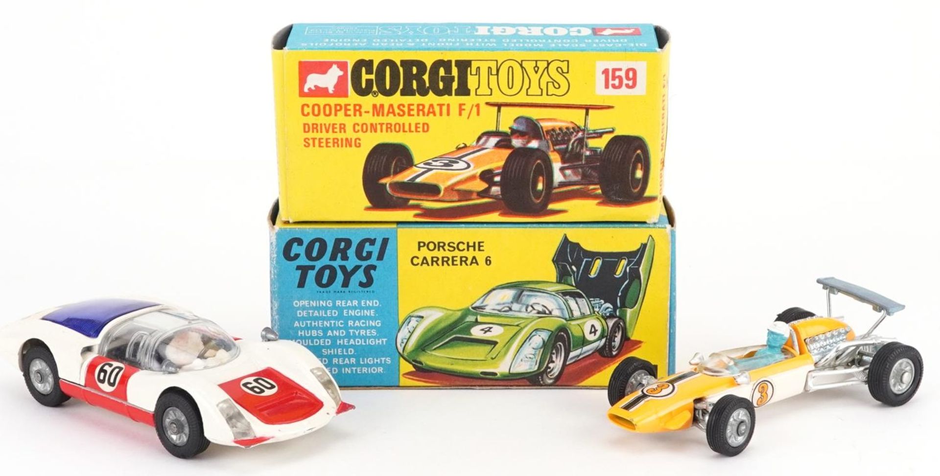Two vintage Corgi Toys diecast racing vehicles with boxes comprising Porsche Carrera 6 330 and