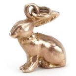 Unmarked gold charm in the form of a seated rabbit, tests as 9ct gold, 1.4cm high, 4.0g