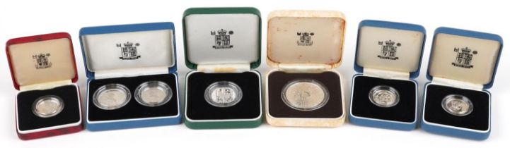 Silver proof coins with fitted cases by The Royal Mint including ten pence two coin set, 1992 silver