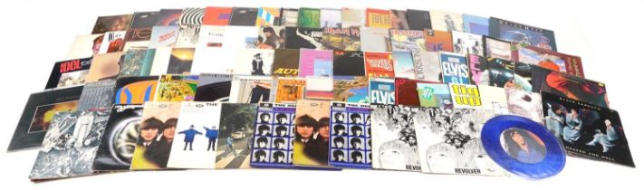 Vinyl LP records including Pink Floyd, Iron Maiden, The Beatles, David Bowie, Jack Bruce, AC/DC,