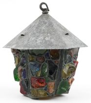 Patinated verdigris lead lantern with colourful glass chunks, 27cm high