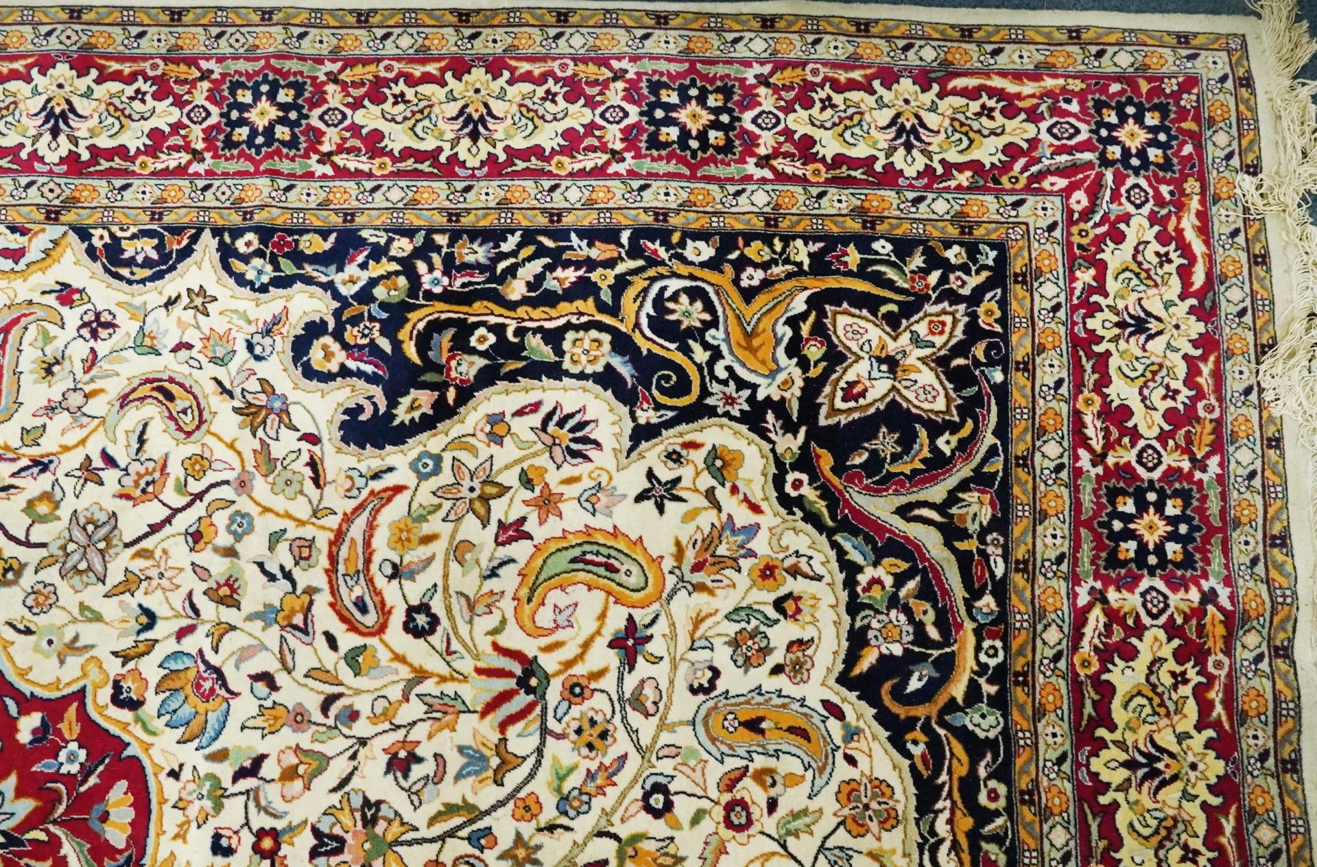 Rectangular Persian cream and red ground rug having an all over repeat floral design, 370cm x 270cm - Image 4 of 12