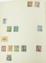 Standard postage stamp album housing various 19th century and later world stamps including Canton