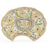 Turkish Ottoman Kutahya barber's bowl hand painted with stylised flowers and foliage, 28cm wide