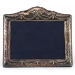 Carrs, rectangular silver easel photo frame embossed with swags and bows, Sheffield 2006, 22cm x