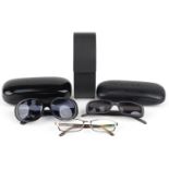 Three pairs of ladies sunglasses with cases comprising two Gucci and Prada