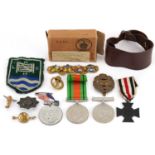 British and German militaria including cross medal, Tank Corps cap badge, two World War II medals