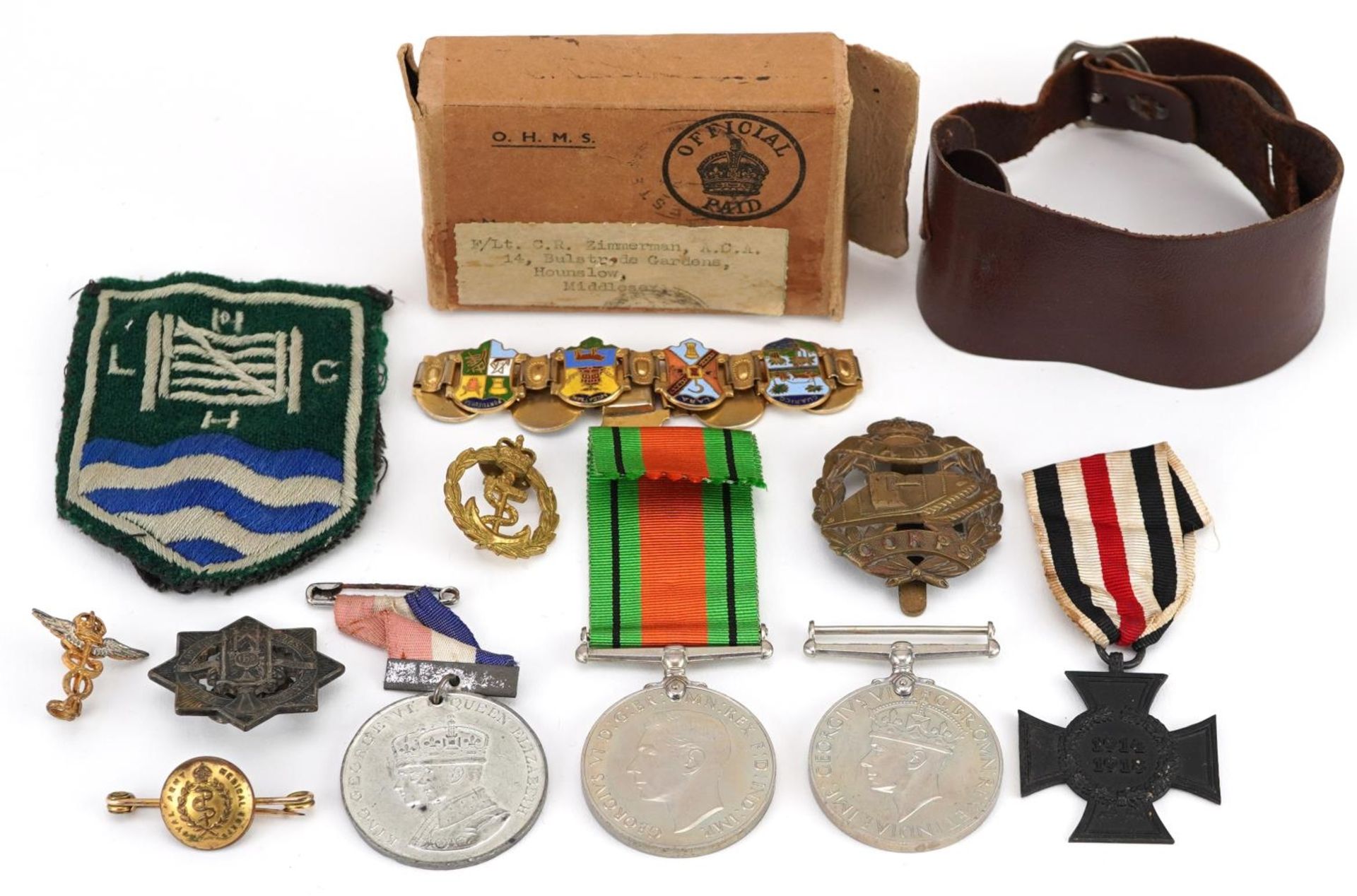 British and German militaria including cross medal, Tank Corps cap badge, two World War II medals